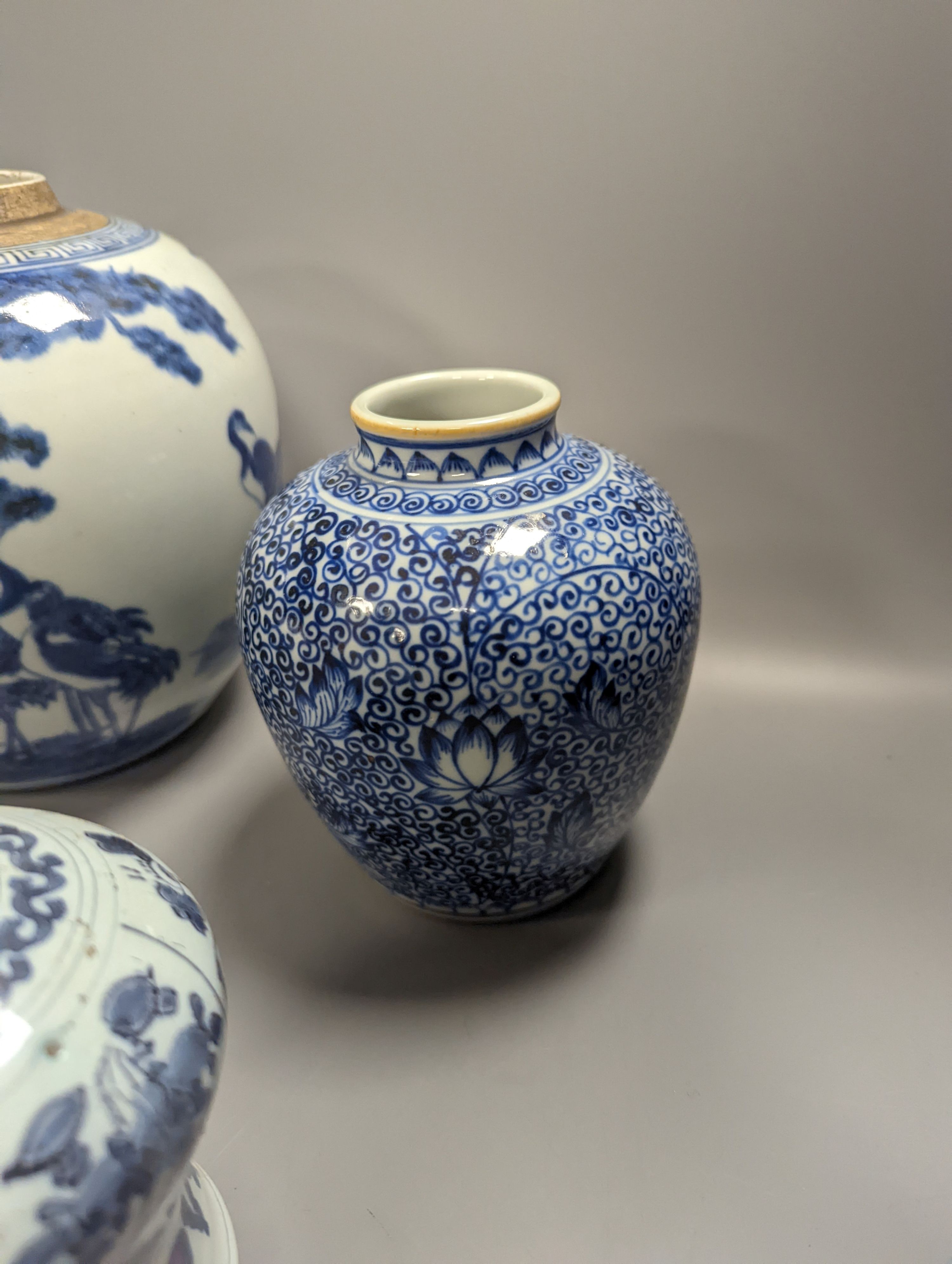 Four Chinese porcelain jars and a delft ware jar, 18cm and a pressed glass powder jar (a.f.)